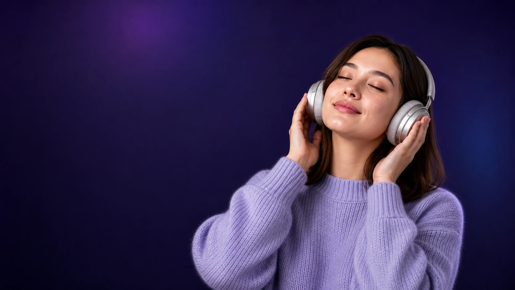 A person listening with headphones, immersed in music
